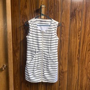 Love this dress but just too short for me. Very flattering